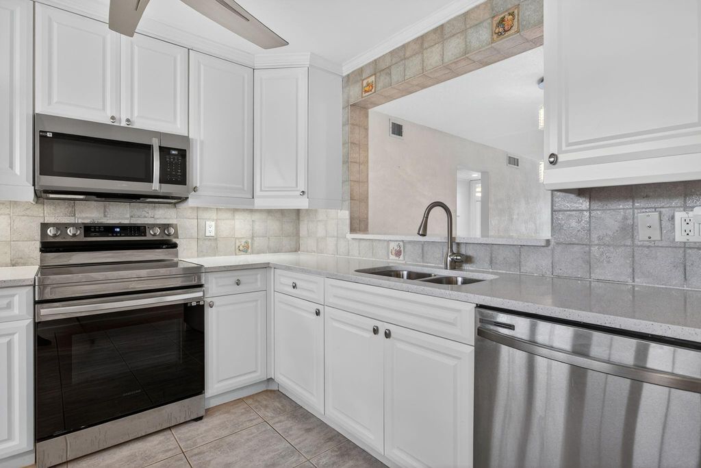 Photo of 2301 Lucaya Lane #M4, Coconut Creek, FL 33066 (MLS # F10532339)