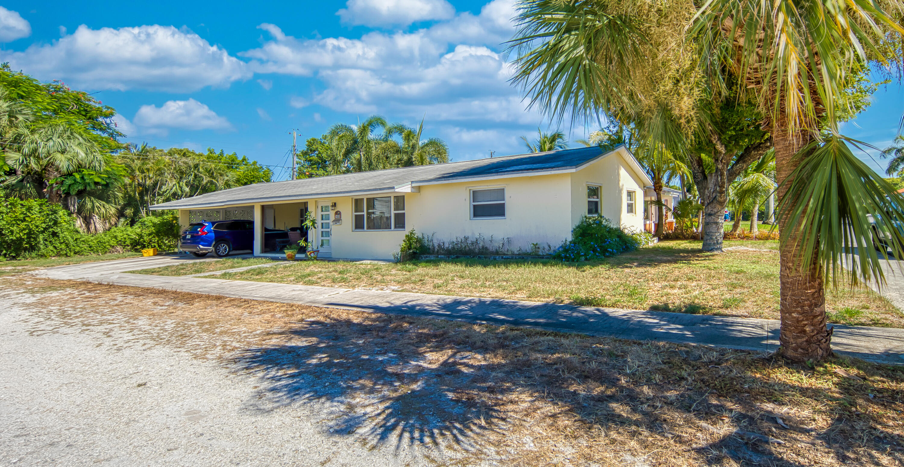 Welcome to your dream home! This spacious, updated three-bedroom, two-bath residence features exceptionally large bedrooms, perfect for families or guests. The inviting open layout includes a modern kitchen with updated appliances, ideal for entertaining. Located east of Federal Highway, you'll enjoy easy access to beautiful beaches, vibrant shopping, and dining options just minutes away. Commuters will appreciate the proximity to major airports and interstate highways, making travel a breeze. With all new impact windows and doors and a two-car carport for convenience, this home offers the perfect blend of comfort and accessibility. Don't miss out on this incredible opportunity--schedule your viewing today!