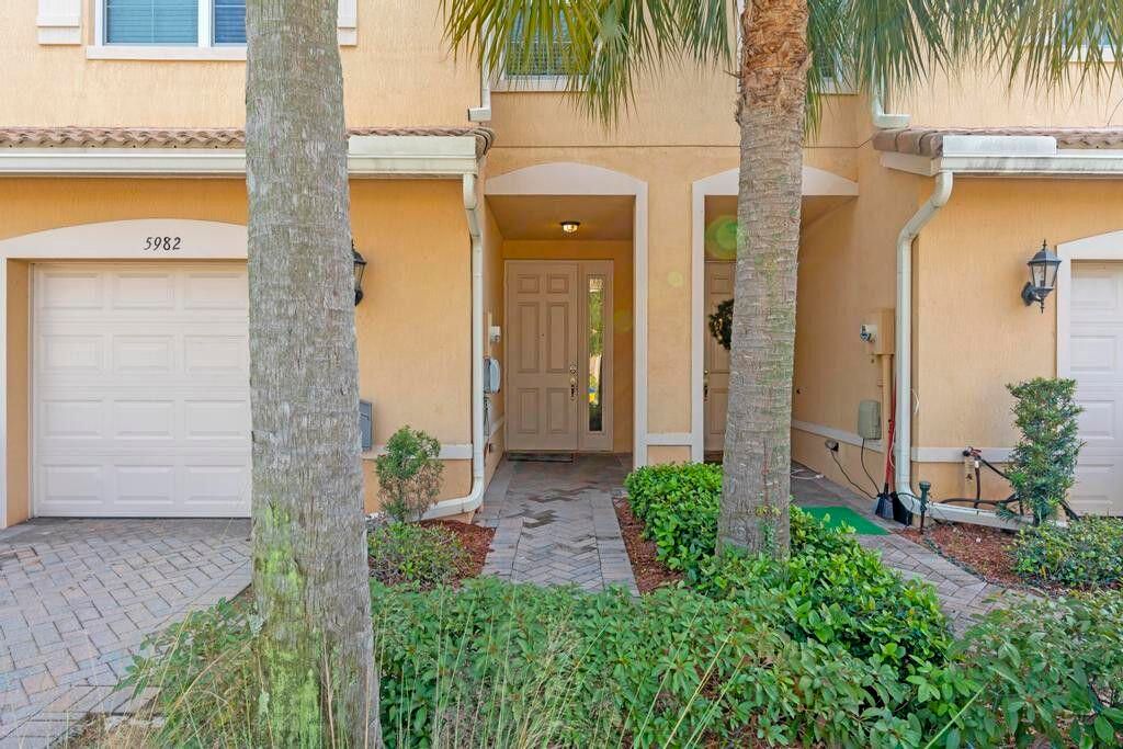 Photo of 5982 Monterra Club Drive, Lake Worth, FL 33463 (MLS # R11160832)