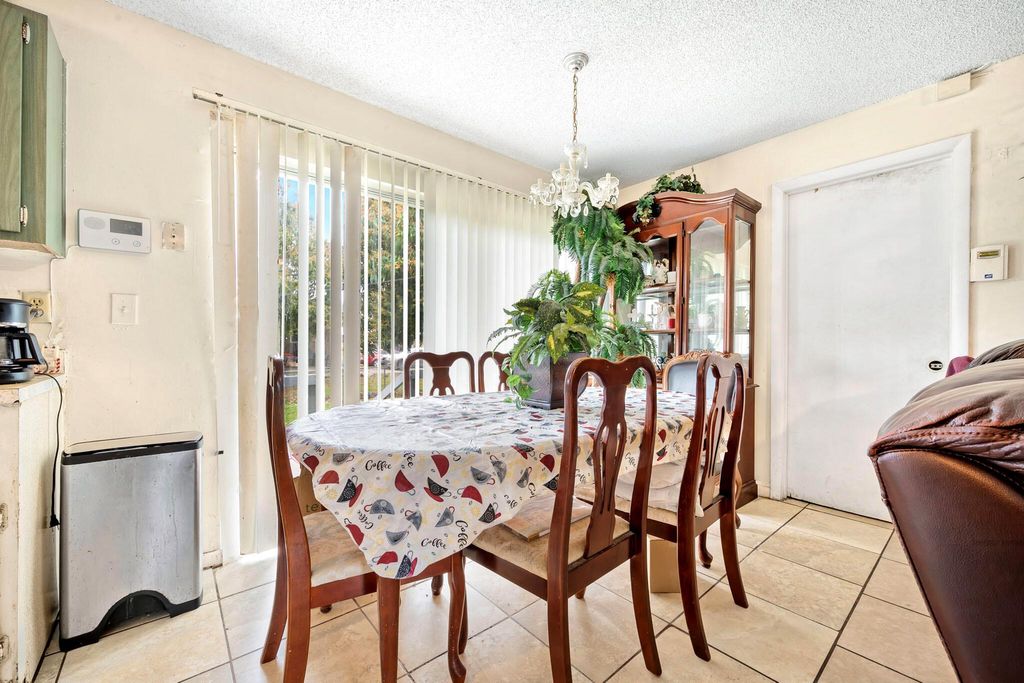 Photo of 932 SW Avenue G Place, Belle Glade, FL 33430 (MLS # R11057666)