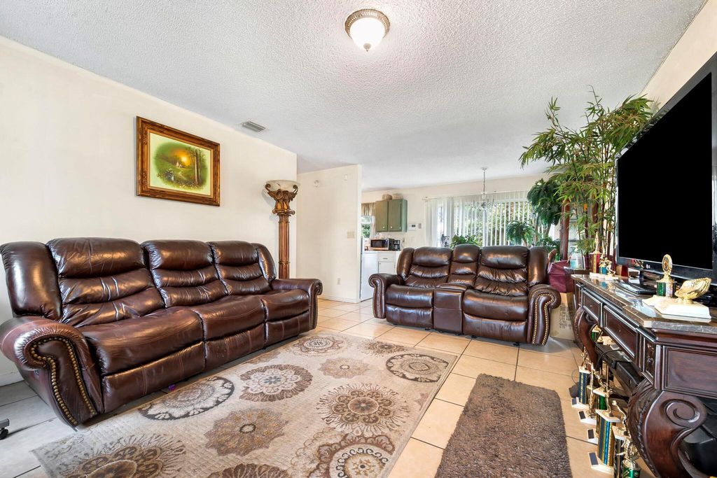 Photo of 932 SW Avenue G Place, Belle Glade, FL 33430 (MLS # R11057666)