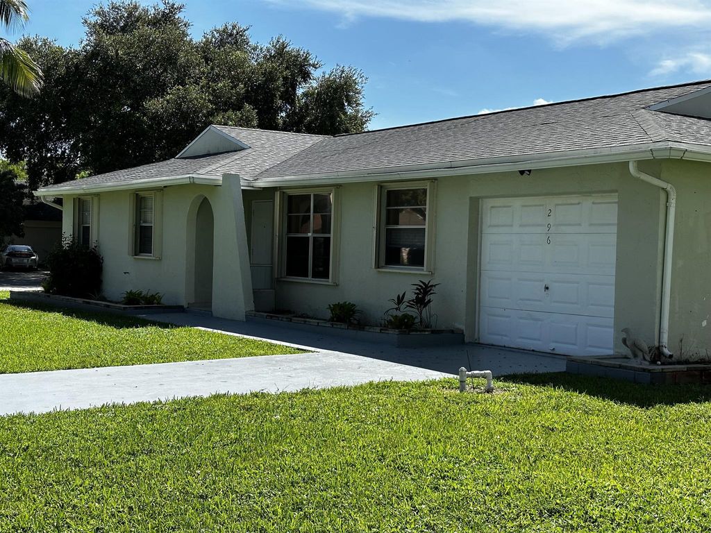 Photo of 296 Sandpiper Avenue, Royal Palm Beach, FL 33411 (MLS # R10921278)