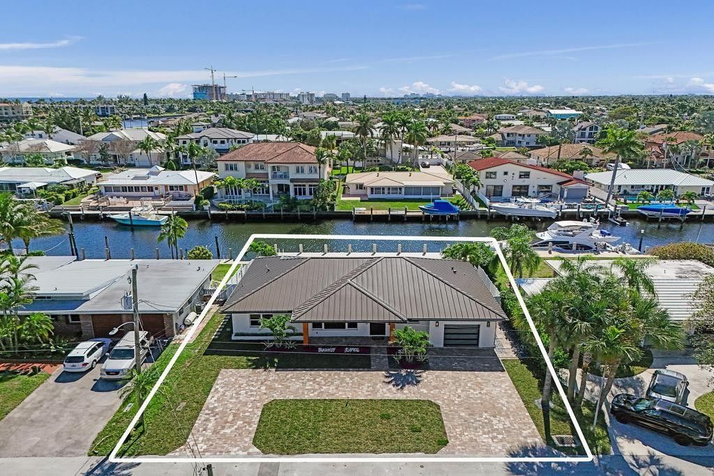 Photo of 1550 SE 8th Street, Deerfield Beach, FL 33441 (MLS # F10548893)