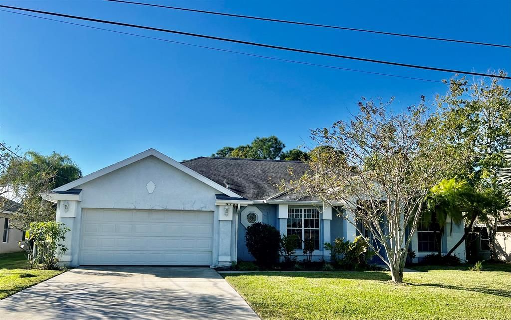 Photo of 5784 NW Esau Avenue, Port Saint Lucie, FL 34986 (MLS # R10843033)