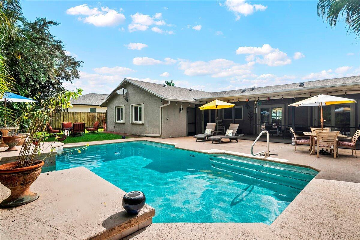 Spend the season in Wellington with comfort, space, and style. This beautifully maintained 3BD/2BA home with a 4th room used as an office that can be converted to a bedroom. This home offers the ideal retreat after long days at the barn. Unwind in the expansive backyard featuring a heated pool, multiple outdoor seating areas, and a large covered, screened patioa''perfect for entertaining or relaxing in privacy. Fully furnished and turnkey, this home provides a hassle-free, hotel-alternative experience tailored to the equestrian lifestyle. Offered at seasonal pricing for a six-month lease.