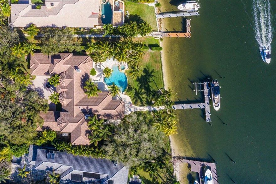 :Absolutely one of a kind! ''Wilsee Retreat'' now presented for the first time in 20 years! Rare opportunity to own an established piece of real estate in the heart of Palm Beach Gardens. Situated perfectly on this high ground 1.04 acre + lot, this sprawling ranch estate has been completely redesigned giving it a 2021 new construction feel. Mature meticulously maintained oak trees surround this incredible waterfront oasis coupling spacious green views with an eastern exposure optimal breeze. Direct intracoastal action on high and wide over-sized rarely seen deep water intracoastal frontage. Marble floors, designer chandeliers, state of the art chefs kitchen, and 25ft soaring ceilings all combine elegance, comfort, and luxury at 2270 Wilsee Rd. Resort style backyard pool & spa, turf grass, coconut palms summer kitchen, and outdoor living all create an incredible spacious atmosphere rarely found in direct intracoastal living. Impact windows, 4 car garage with 4 car lifts (8 total), updated floors, bathrooms, kitchen, and more. House is a must see!