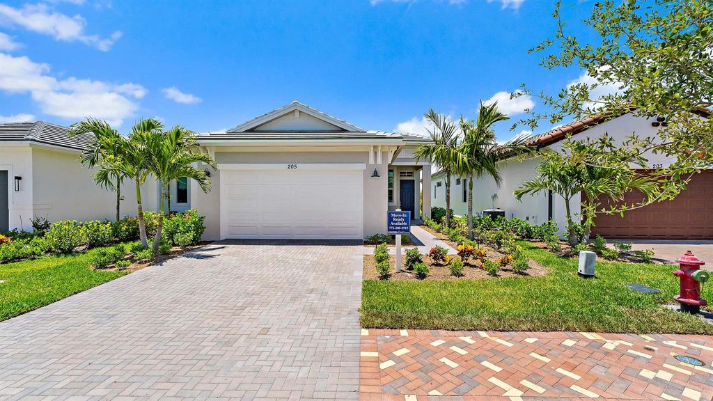 Photo of 205 SE Via Sangro, Port Saint Lucie, FL 34952 (MLS # R11053454)
