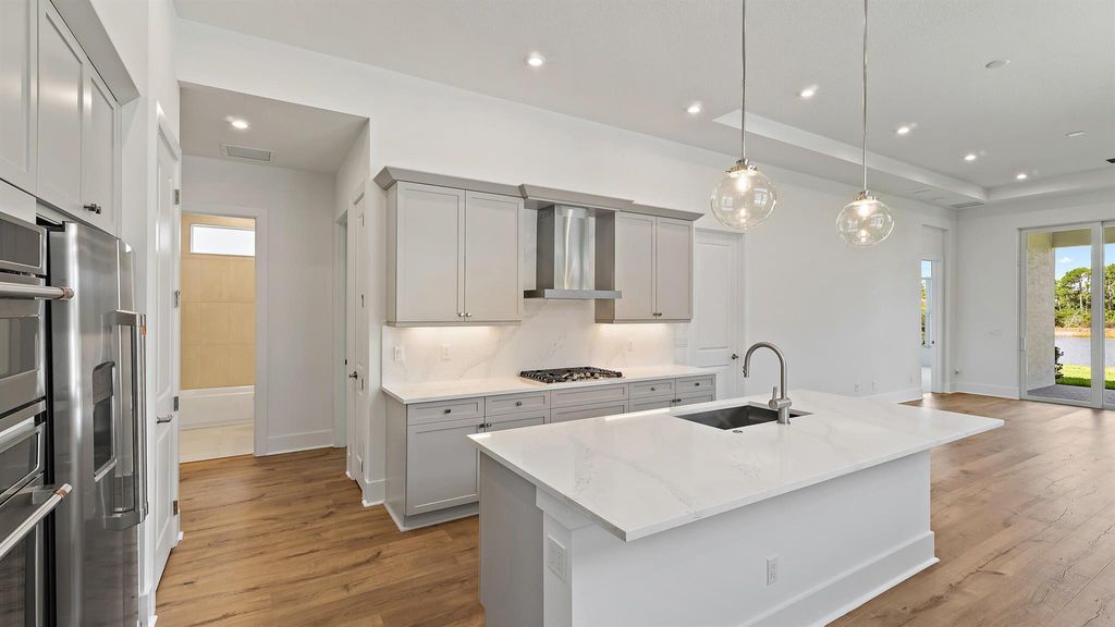 Photo of 205 SE Via Sangro, Port Saint Lucie, FL 34952 (MLS # R11053454)