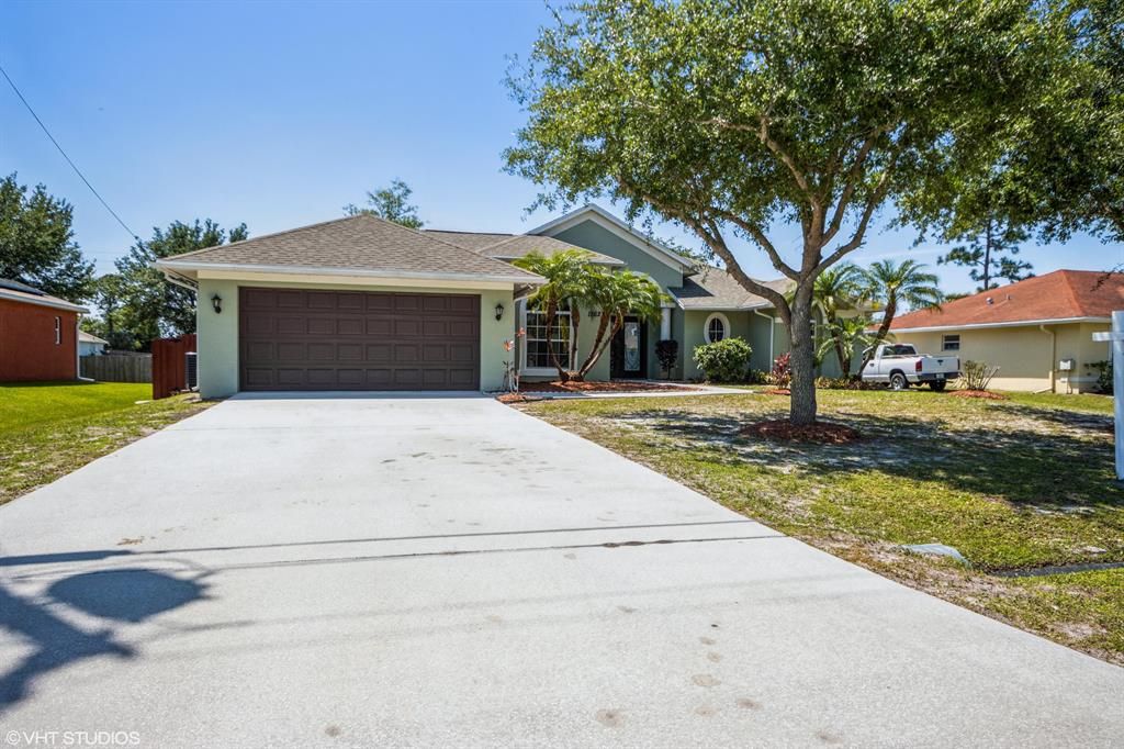 Photo of 1262 SW Medina Avenue, Port Saint Lucie, FL 34953 (MLS # R10710759)