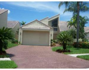 Guard gated and superbly located. Very spacious split floor plan with volume ceilings. Beautiful Lake view. Eat in kitchen. New kitchen with granite just installed! New vanities with granite in Bathrooms! Just painted and landscaped! New carpet in bedrooms! Large stone tile in living areas. Great community area with large fitness room, pool, playground and Tennis.