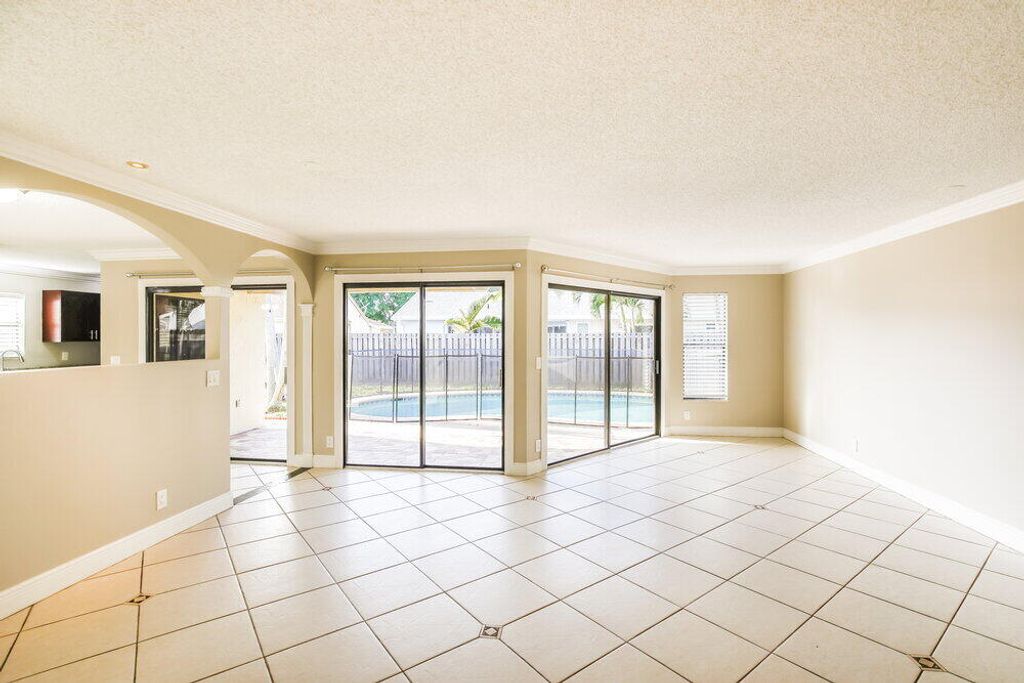 Photo of 11235 NW 43rd Place, Coral Springs, FL 33065 (MLS # B26044432)