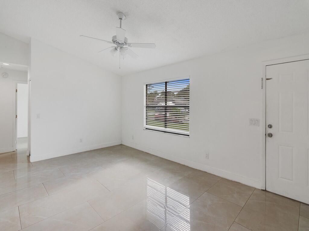 Photo of 3657 SW Masilunas Street, Port Saint Lucie, FL 34953 (MLS # R10956144)