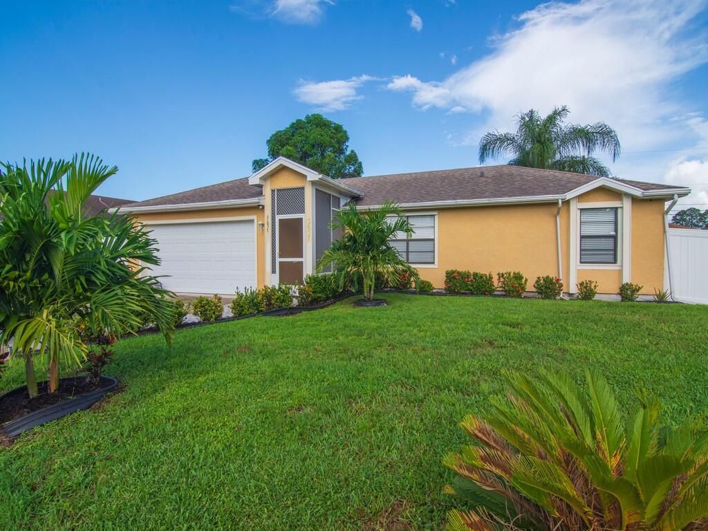 Photo of 3657 SW Masilunas Street, Port Saint Lucie, FL 34953 (MLS # R10956144)