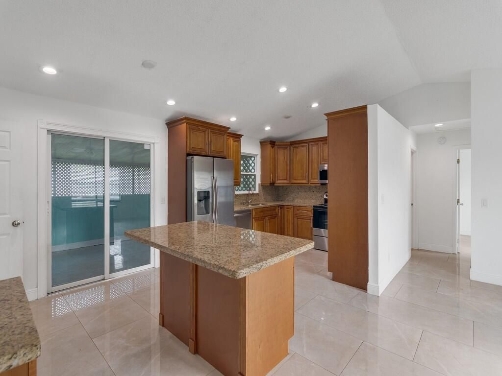 Photo of 3657 SW Masilunas Street, Port Saint Lucie, FL 34953 (MLS # R10956144)