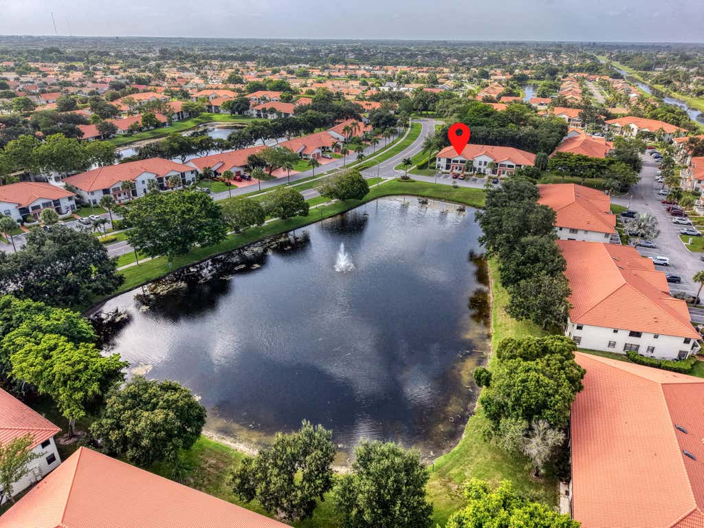 Photo of 5585 Munsel Lane #102, Boynton Beach, FL 33437 (MLS # B26051242)