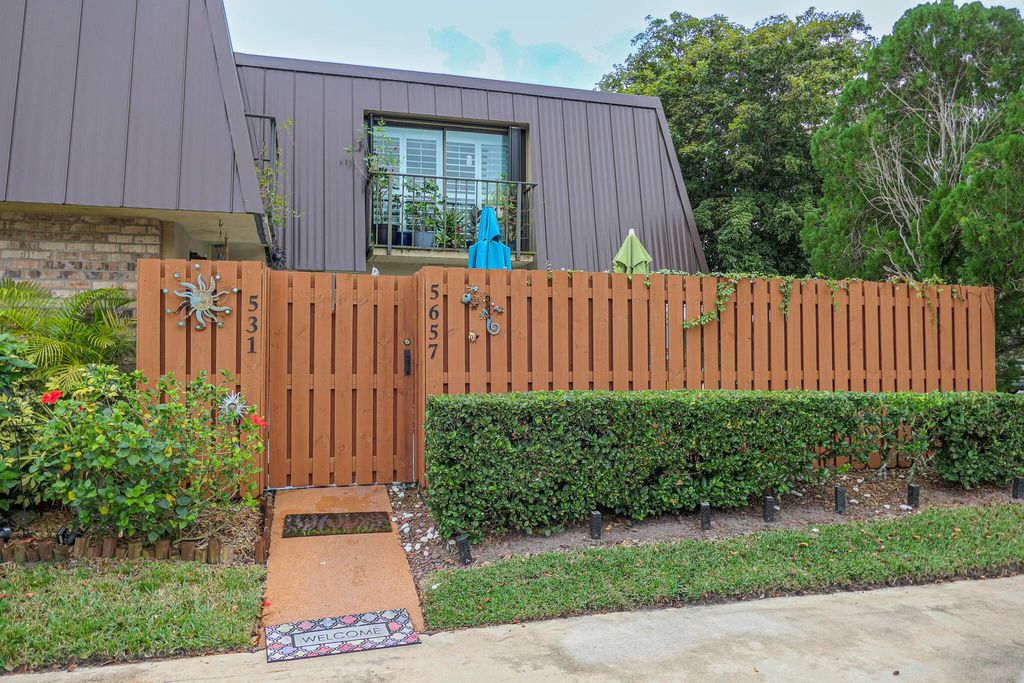 Photo of 5657 SE Windsong Lane, Stuart, FL 34997 (MLS # R10952337)