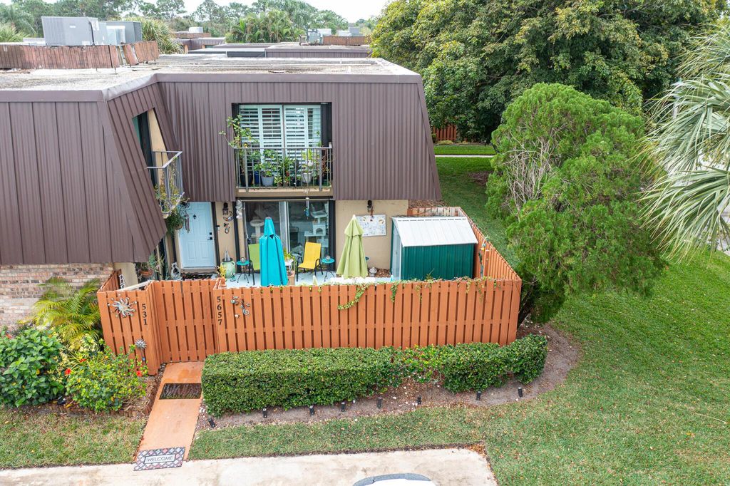 Photo of 5657 SE Windsong Lane, Stuart, FL 34997 (MLS # R10952337)