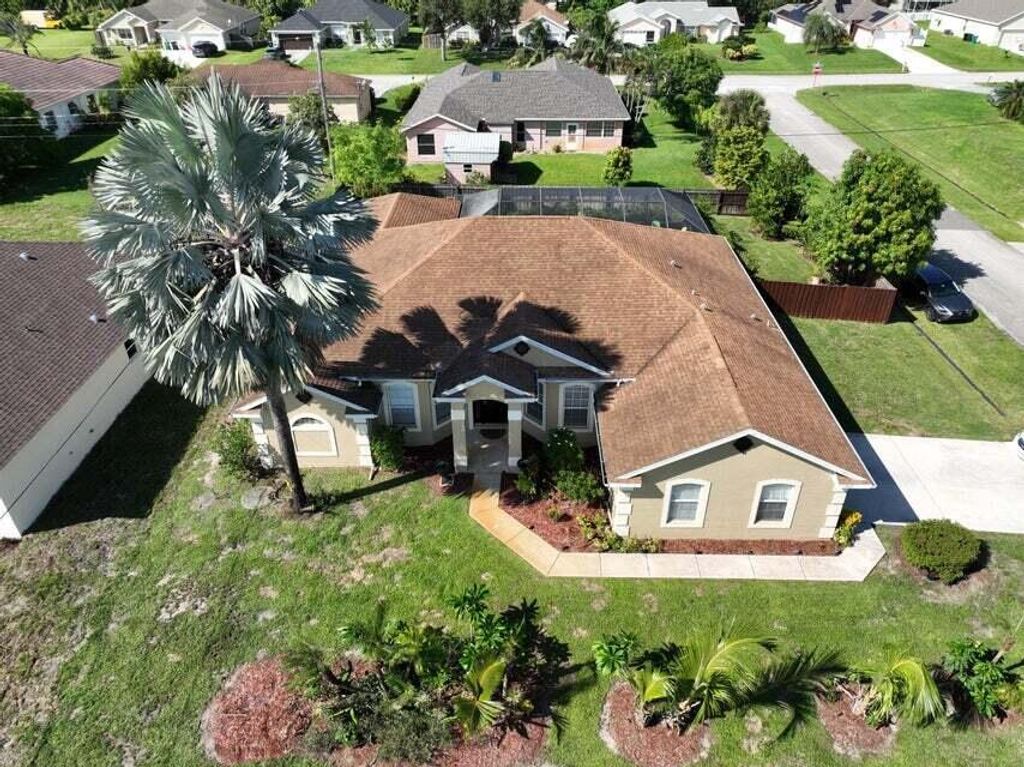 Photo of 1601 SW Crawford Avenue, Port St Lucie, FL 34953 (MLS # R10872028)