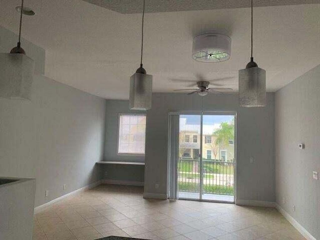 Photo of 10480 SW Stephanie Way #3-203, Port Saint Lucie, FL 34987 (MLS # R10986291)