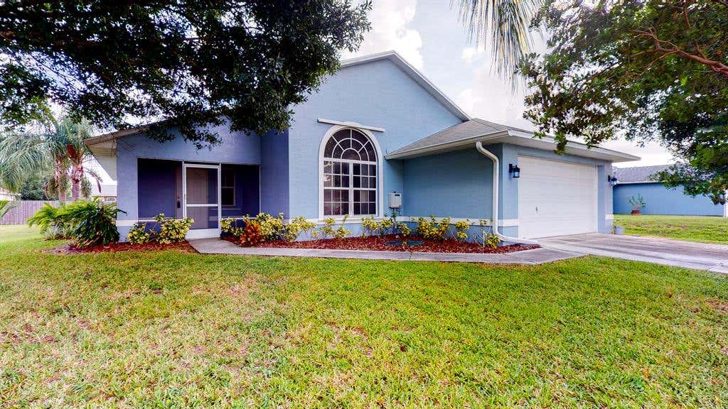Photo of 359 SW Duxbury Avenue, Port Saint Lucie, FL 34983 (MLS # R10733133)