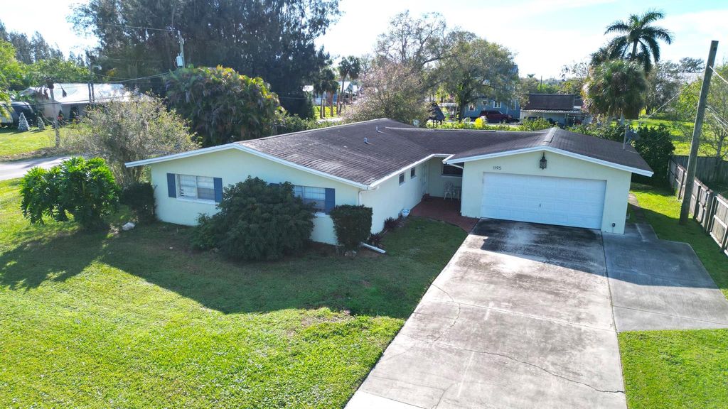 Photo of 1195 Country Gardens Lane, Fort Pierce, FL 34982 (MLS # R11048883)