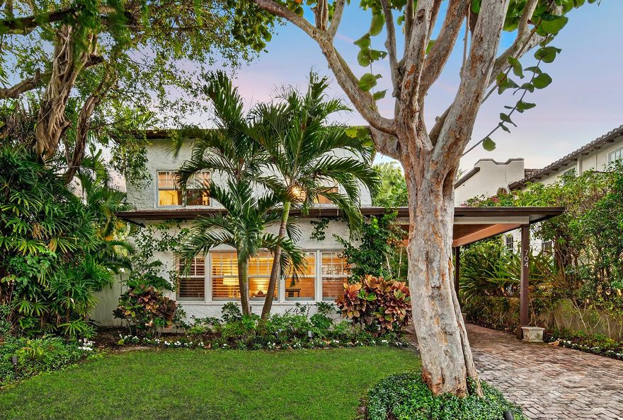 Welcome to 704 Claremore Drive in the heart of Flamingo Park. Built in 1925, this tranquil Spanish residence captures the grace of West Palm Beach's historic era while offering the comfort of modern living. 3 BD/2.5 BA Main House (Note: all 3 bedrooms are upstairs), a powder room/cabana bath downstairs, 2042 tsf/1834 under air, covered parking, a sunroom, a generous living room w/ original hardwood floors, high ceilings, wood-burning fireplace, charming dining room, updated kitchen, & cozy breakfast nook. Private backyard: mosaic-tiled, newly resurfaced, salt swimming pool & serene patio. 1 BD/1 BA Cottage (ground floor), 568 tsf, full kitchen. With impact windows, updates throughout & brick-paver driveway, this historic home offers a blend of period character & modern comfort.