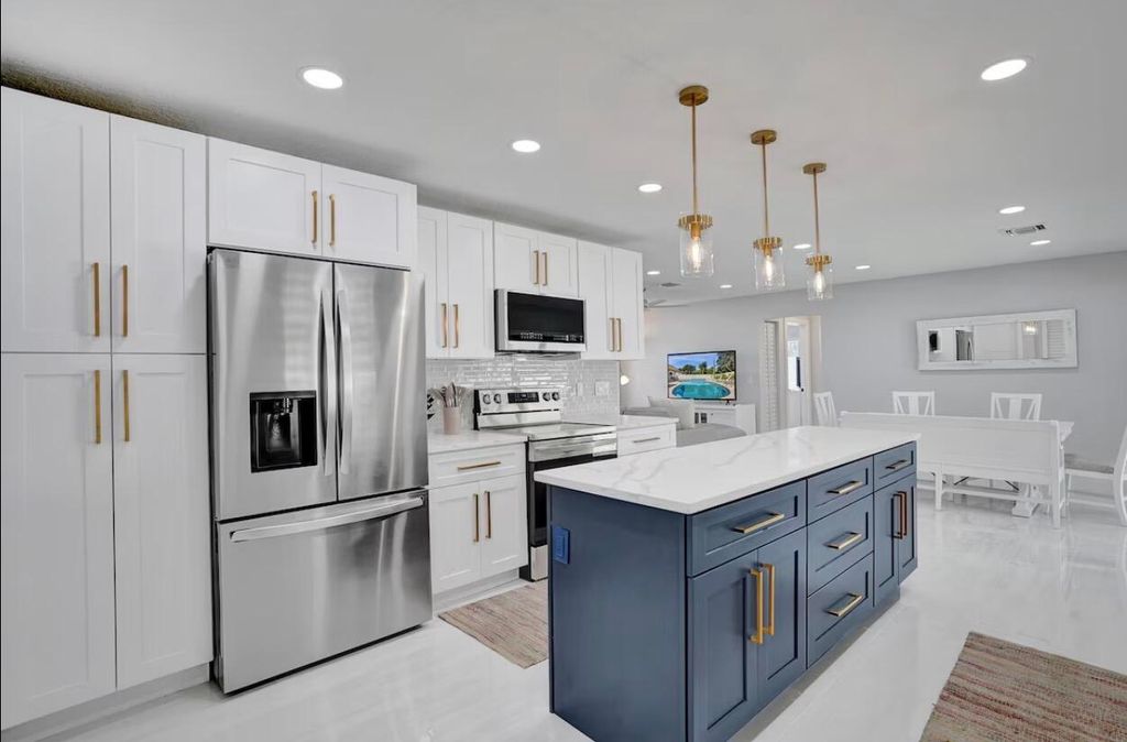 Photo of 521 Curlew Road, Delray Beach, FL 33444 (MLS # B26006070)