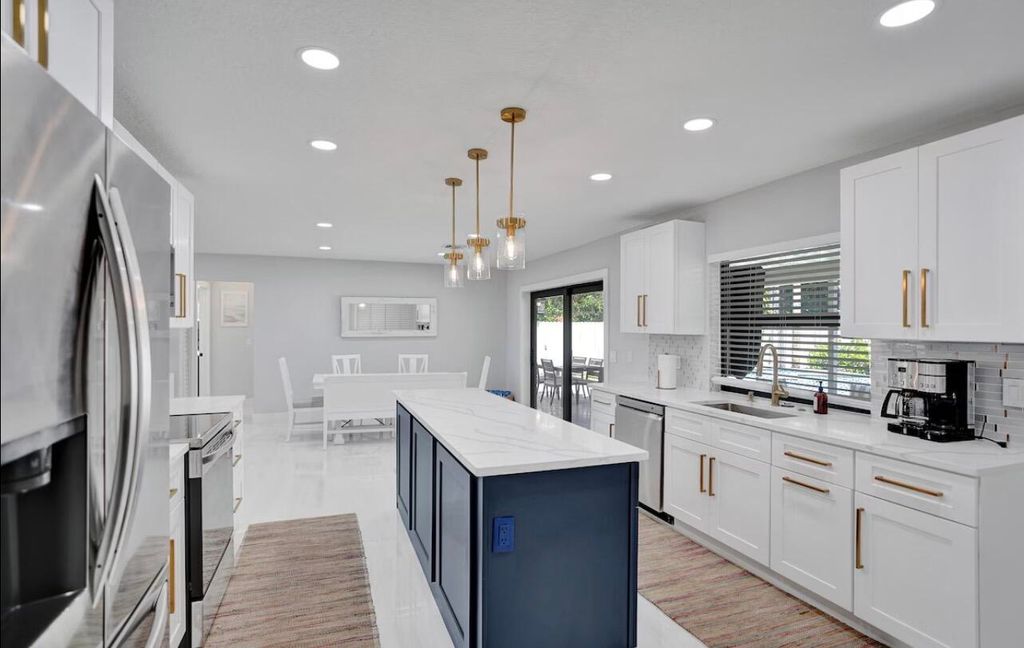 Photo of 521 Curlew Road, Delray Beach, FL 33444 (MLS # B26006070)