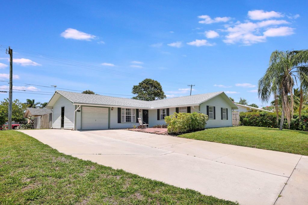 Photo of 1659 NE 23rd Terrace, Jensen Beach, FL 34957 (MLS # R10991515)