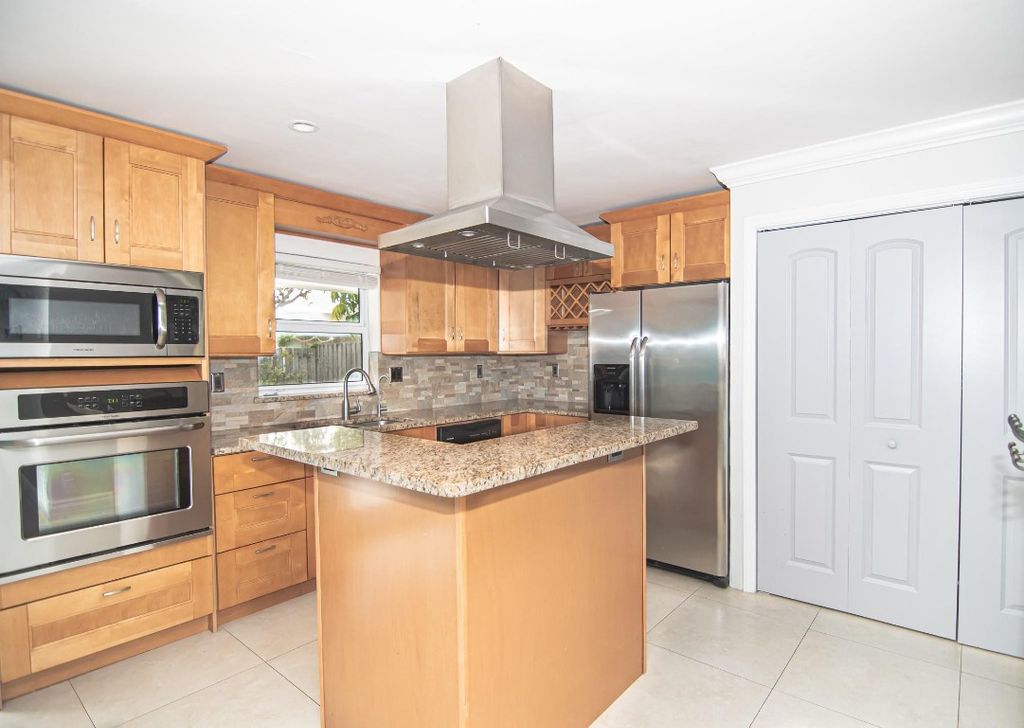 Photo of 1313 SE 2nd Terrace, Deerfield Beach, FL 33441 (MLS # F10496174)