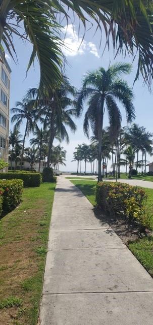 WELCOME HOME! This boutique townhome community sits just steps from Deerfield Beach, where you can relax on your balcony and take in sweeping, unobstructed ocean views. Walk to restaurants, shops, and all the amenities the beach lifestyle has to offer! The first floor features a spacious bedroom with its own full bath, large closet, and access to a private rear patio, along with a washer/dryer and storage area. Upstairs, the open-concept living and kitchen space flows seamlessly to the front balcony overlooking the ocean—perfect for entertaining. The primary suite includes a full bath and a generously sized finished closet, plus there’s a convenient half bath for guests. Ample cabinetry and countertop space complete the kitchen. AVAILABLE EARLY OCTOBER. ANNUAL UNFURNISHED ONLY!! NO GARAGE!