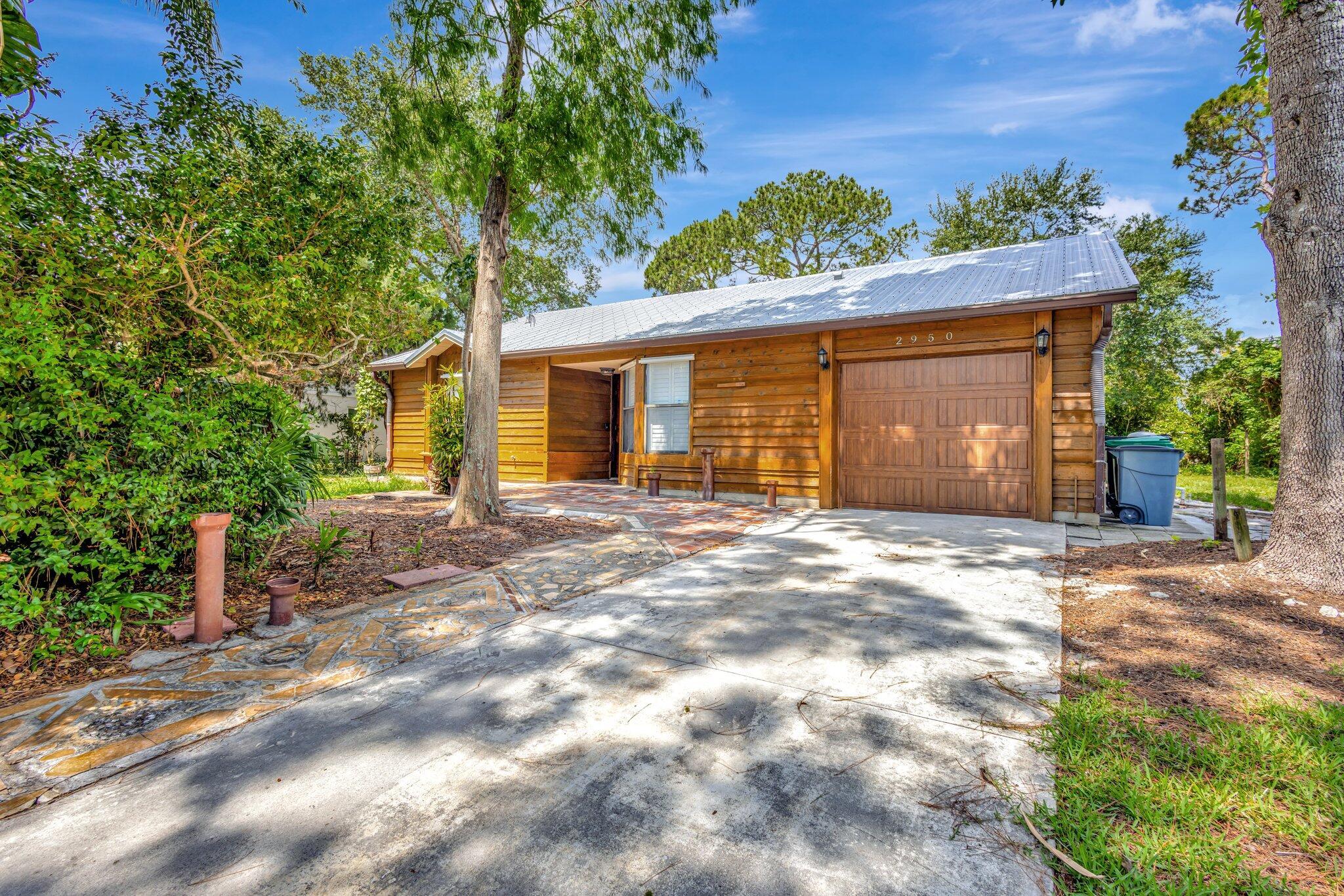 BRING YOUR OFFERS. MOTIVATED SELLER. Discover this unique, artsy single-family home in a prime location. Featuring 3 bedrooms and 2 baths, it combines rustic charm with modern comforts. The spacious backyard is perfect for relaxation or outdoor activities. Ideally situated, it's walking distance to retail stores and in a great school zone. A rare find, this home won't last long! Call us for a viewing and make it your cozy retreat. New roof and skylight in 2022, AC 2024, hot water heater 2021, garage door 2019. Plantation shutters throughout. Large Shed for extra storage. LOT SIZE 10,019 sf! Plenty of room for a Pool!