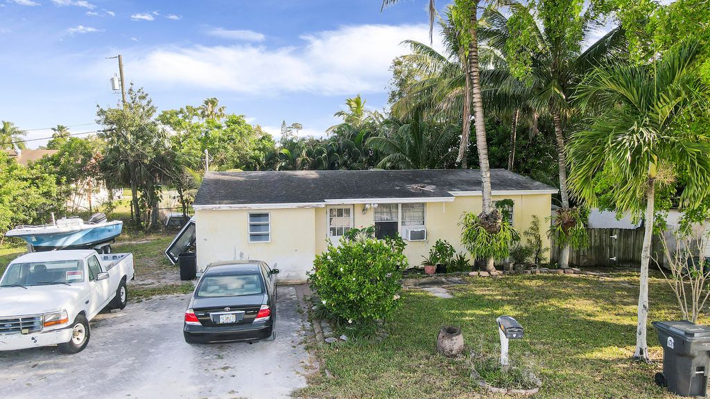Photo of 9015 Twig Road Rd, Lake Worth Beach, FL 33467 (MLS # R10789787)