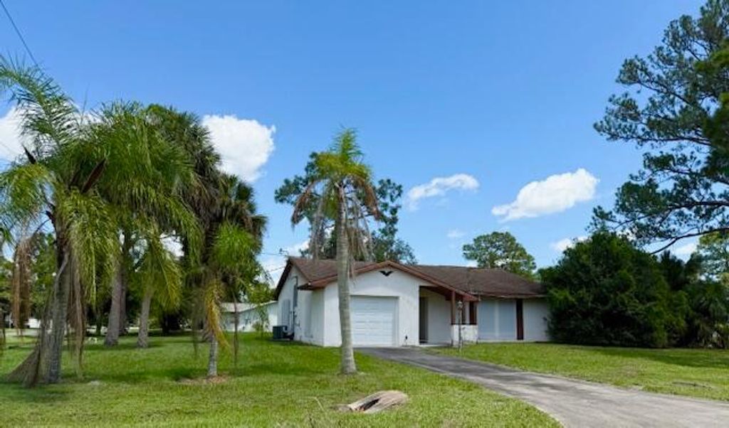 Photo of 6806 Pensacola Road, Fort Pierce, FL 34951 (MLS # R11119900)