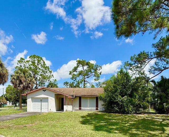 Opportunity knocks with this 3-bedroom, 2-bath home located on a large corner lot in a desirable, established neighborhood. Featuring a functional floor plan, a 1-car garage, and plenty of potential to make it your own. Whether you're an investor or a homeowner looking to build sweat equity, this property is full of possibilities. Bring your vision and transform this diamond in the rough into a dream home. New A/C in 2016. New garage door in June. Being sold AS/IS and partially furnished. Priced to sell - don't miss out!