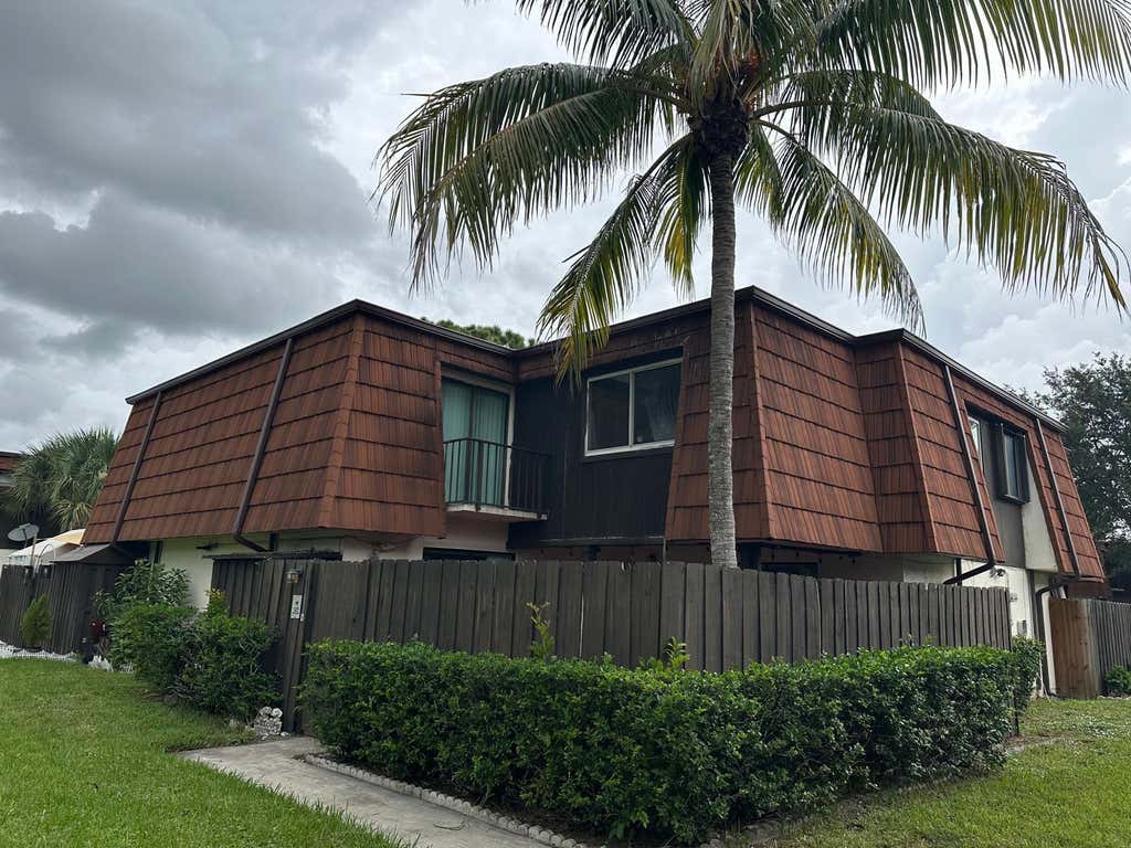 Photo of 2100 WHITE PINE Circle #D, Greenacres, FL 33415 (MLS # B26060058)
