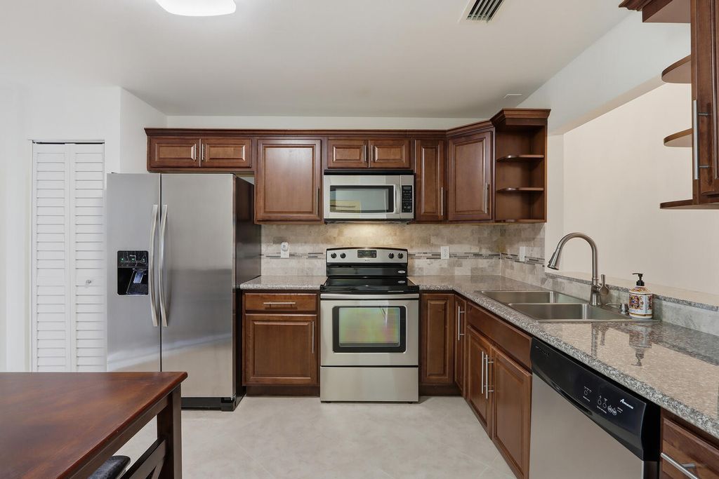 Photo of 4330 Lucerne Villas Lane, Lake Worth, FL 33467 (MLS # R11166975)