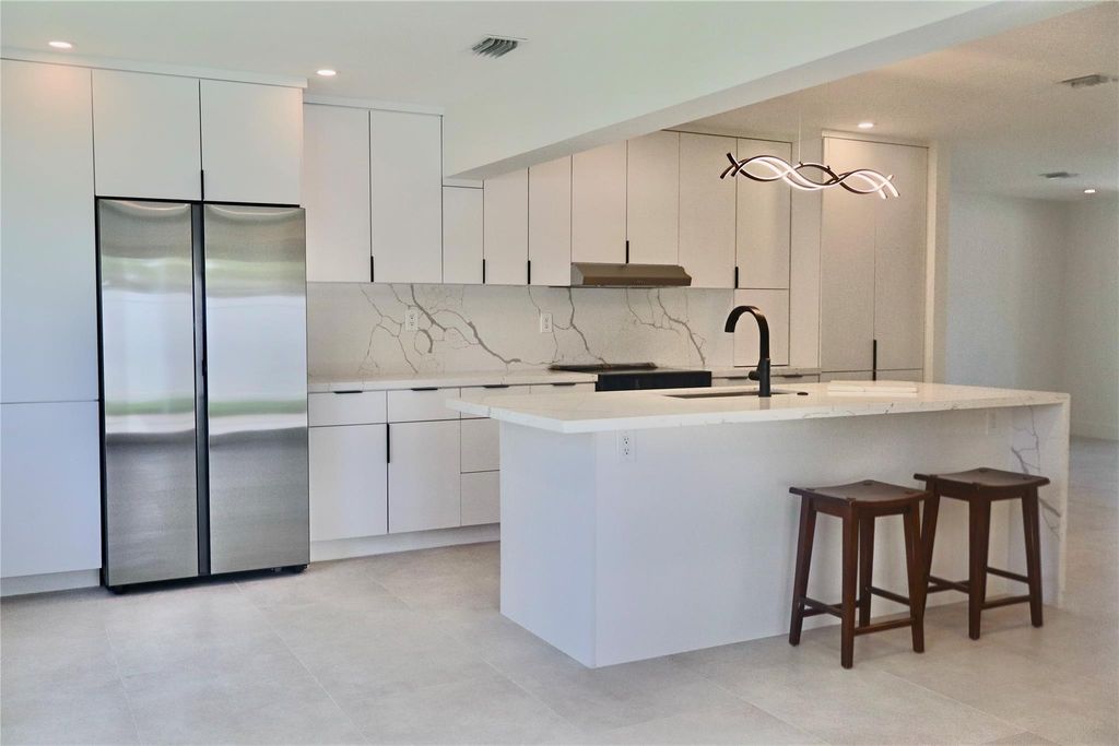 Photo of 5240 NE 17th Terrace, Fort Lauderdale, FL 33334 (MLS # F10501564)