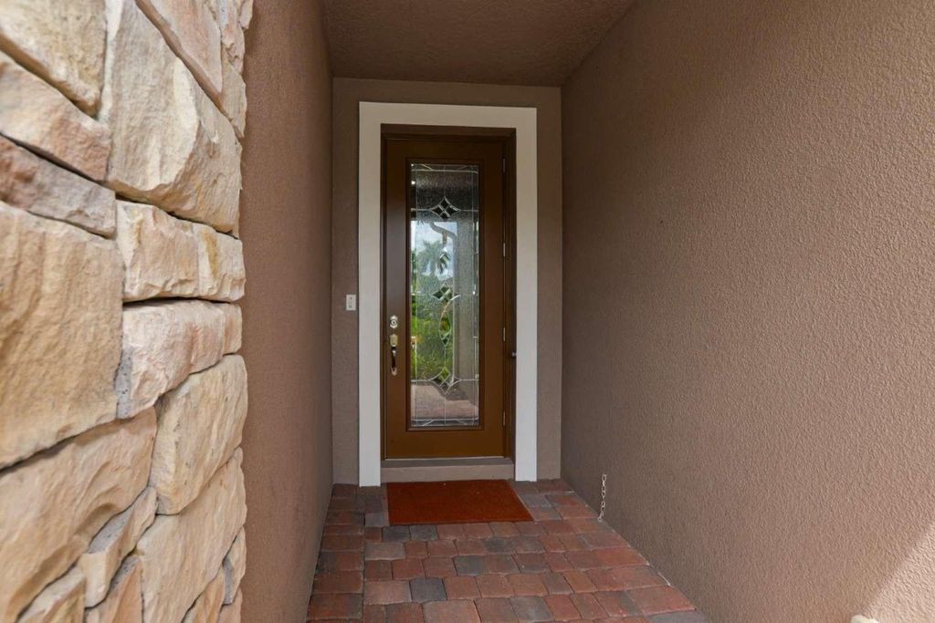 Photo of 10101 SW Fernwood Avenue, Port Saint Lucie, FL 34987 (MLS # F10500218)