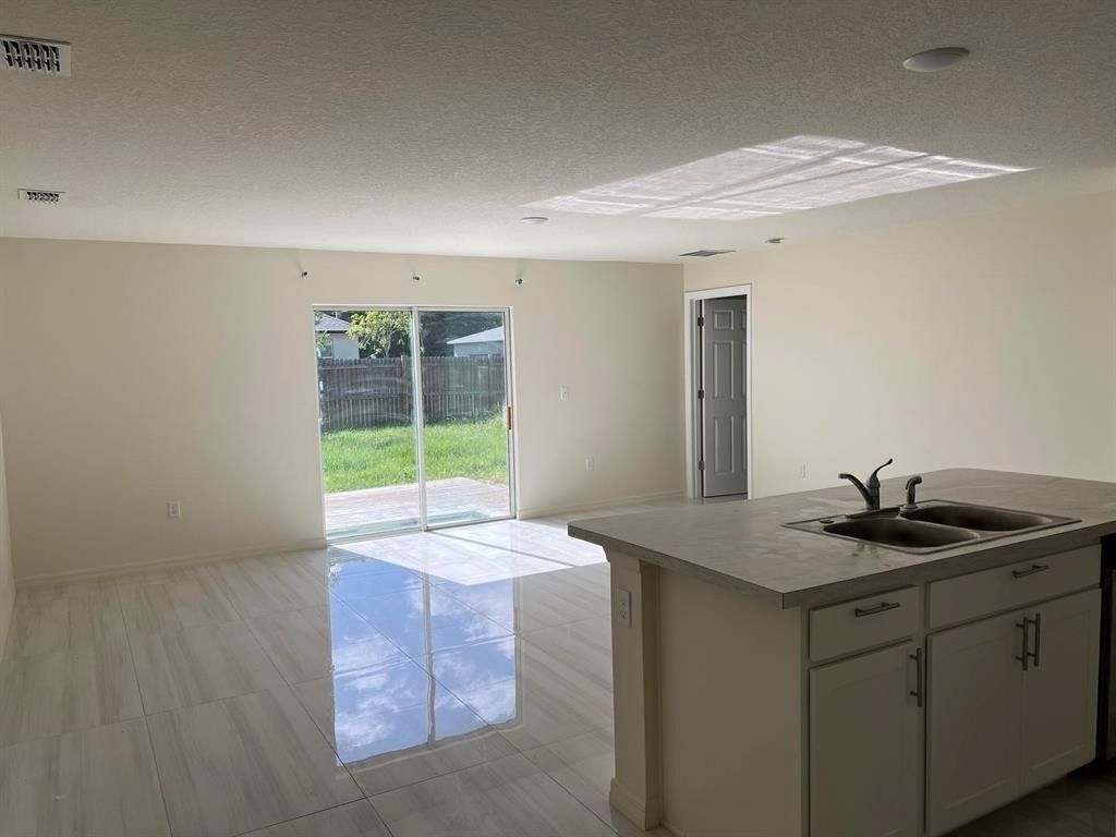 Photo of 1714 SW Haylake Avenue, Port Saint Lucie, FL 34953 (MLS # F10542581)