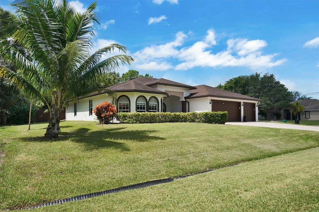 Photo of 992 SW Haleyberry Avenue, Port Saint Lucie, FL 34953 (MLS # F10454455)