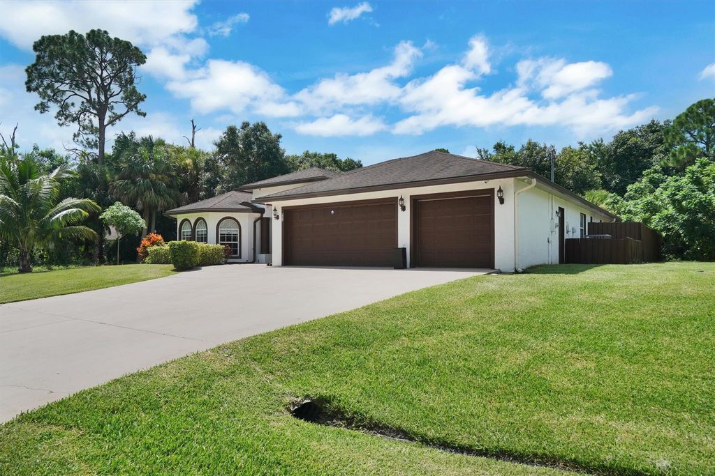 Photo of 992 SW Haleyberry Avenue, Port Saint Lucie, FL 34953 (MLS # F10454455)