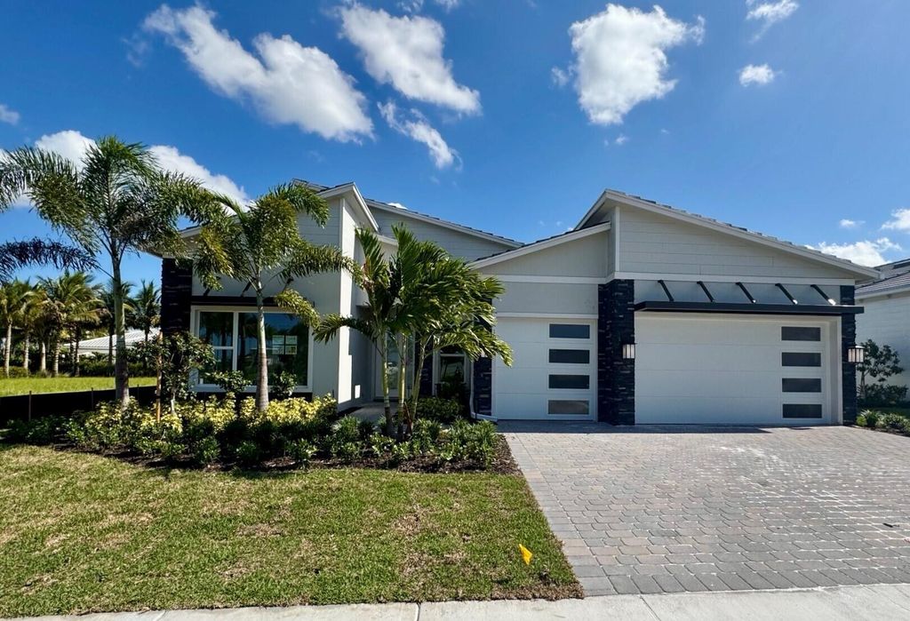 Photo of 10705 Stellar Circle #Stellar 56, Palm Beach Gardens, FL 33412 (MLS # R11099951)