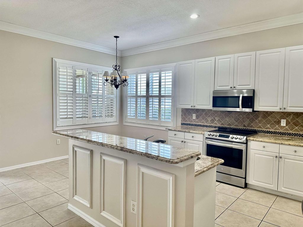 Photo of 635 SW Indian Key Drive, Port Saint Lucie, FL 34986 (MLS # R11110531)