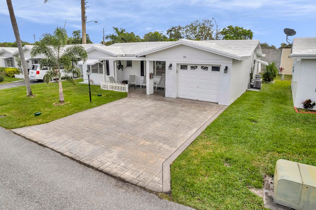 Photo of 340 NW 24 Court, Pompano Beach, FL 33064 (MLS # R10963971)