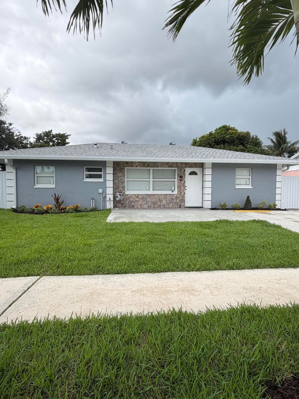 Photo of 5612 S 36th Street, Greenacres, FL 33463 (MLS # B26049738)
