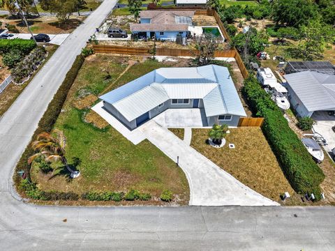 Photo of 9361 SE Duncan Street, Hobe Sound, FL 33455 (MLS # B26021294)
