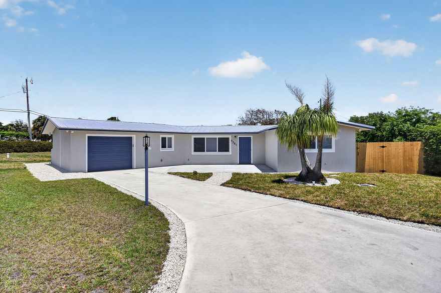 COMPLETELY REMODELED TOP TO BOTTOM!!! Solid CBS 3 Bed/2 Bath/1 Car-Garage.  As soon as you drive up you will notice Fresh Paint, New 2025 Metal Roof!  New Impact Windows & Doors!  Upon entering you will see the Wide-Open Floor Plan & Porcelain Tile Floors, New Baseboards Throughout!  New Kitchen w/White & Navy Shaker Cabinets, Quartz Countertops, Stainless Appliances! All New Electrical Wiring & Plumbing!  New A/C Ducts & Vents, Water Filtration System. Epoxy Floors in Garage, New Impact Garage Door! Tons of High-Hat Lighting!  Baths Redone w/Designed Touches!  2-Brand New 100' Well & Drain Field! Interior Laundry Room ($5,000 Credit for Washer & Dryer and Blinds). New Blown Insulation!  Great Location close to Beach, Golf, Restaurant's & NO HOA! Bring your Boat, RV & Toys!! MAKE OFFER!!!