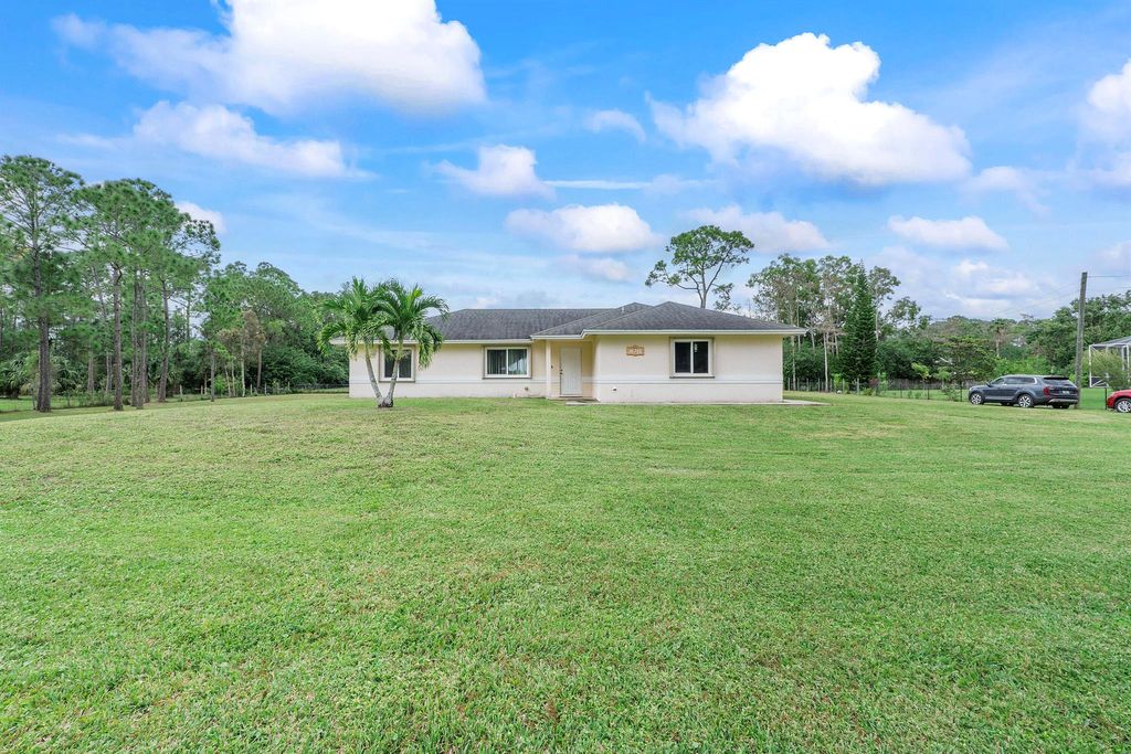 Photo of 16367 83rd Place N, Loxahatchee, FL 33470 (MLS # R10942698)