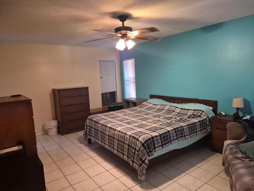 What's special about this property?  Besides a unique opportunity to rent to own, this 3/2/2 features a kitchen with ample space, open floor plan.  Spacious lot - Approximately half-acre. Bad Credit -okay! Home ready for occupancy on 1/15/26Conveniently located near shopping, dining, parks, and excellent schools, this home is a great option for first-time buyers, investors, or anyone looking to customize a property in a thriving community. Don't miss this opportunity to transform this house and take advantage of its strong potential. an interior canal behind the property enhances privacy. The home is located in the Floresta Gardens neighborhood, close to the Port St. Lucie Community Center and Kiwanis Park. Kiwanis